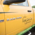 A work truck for Royal Lawn Care with a grassy design