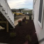 Exterior of newly built house with mulch
