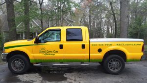 Yellow Royal Lawn Care Truck