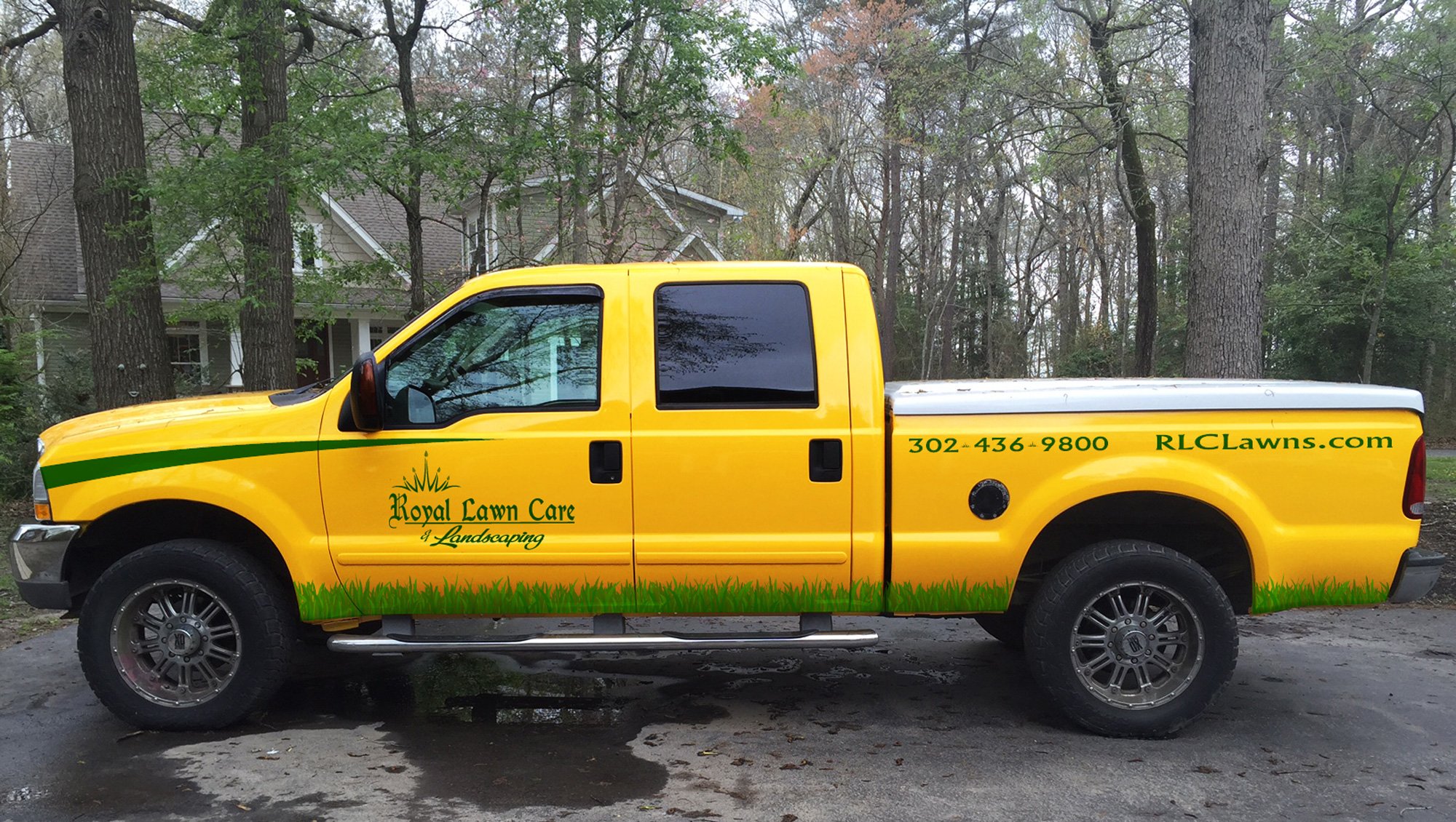 Yellow Royal Lawn Care Truck